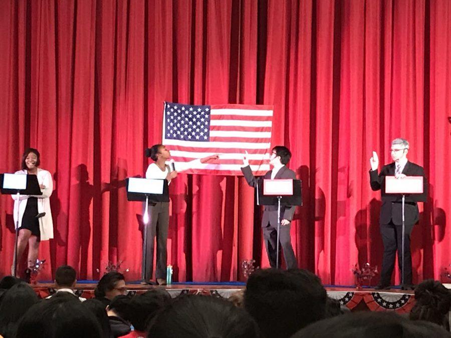 Students posing as Hillary Clinton, Donald Trump, Jill Stein, and Gary Johnson participate in the Mock Debate at Francis Lewis High School