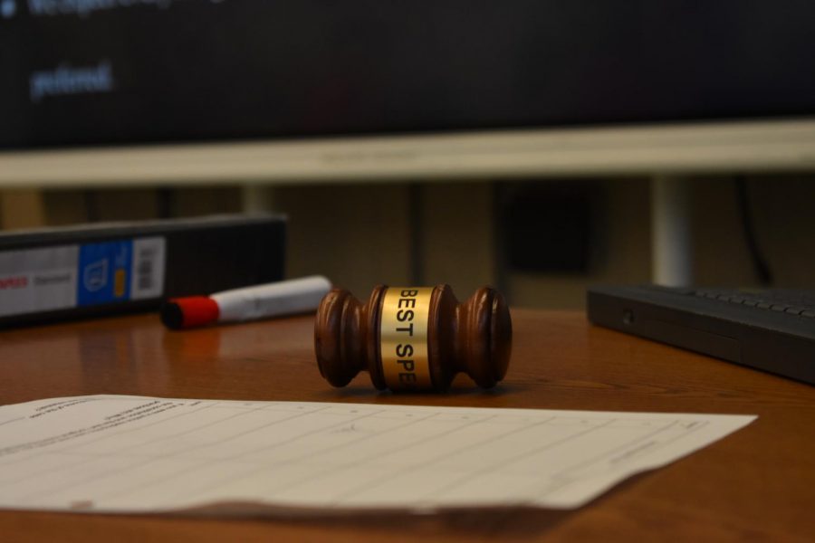 There is a gavel with the words Best Speaker on it, which can be utilized by the student leading discussions.