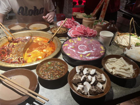 Left Row : Beef, Lamb, Milky Beef, Bean Curd, Mushrooms.

Right Row : Bean Curd Roll, Shrimp Paste, Enoki Mushrooms.
Soup (Left to Right) : Spicy Broth, Tomato Broth.
