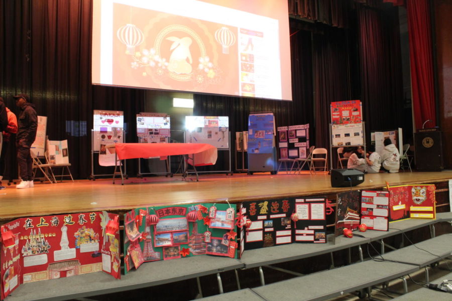 The various posters displayed on the auditorium stage to allow the students to experience and interact with the different cultures present in the FLHS community.