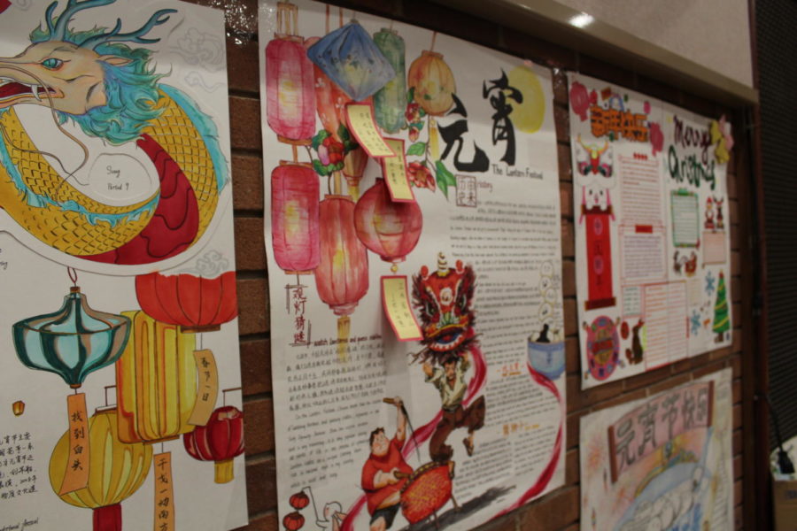 Illustrations of dragons and lanterns which are traditionally shown in Chinese cultures. The second poster shows a lion dance illustration which is traditionally done around Lunar New Year. 

