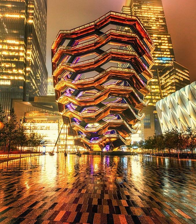 The Vessel is a 150-foot, 16-story structure of connected staircases that was designed by Thomas Heatherwick. Even though it was closed on July 29, 2021,  it still makes for a terrifically towering sight to see.
