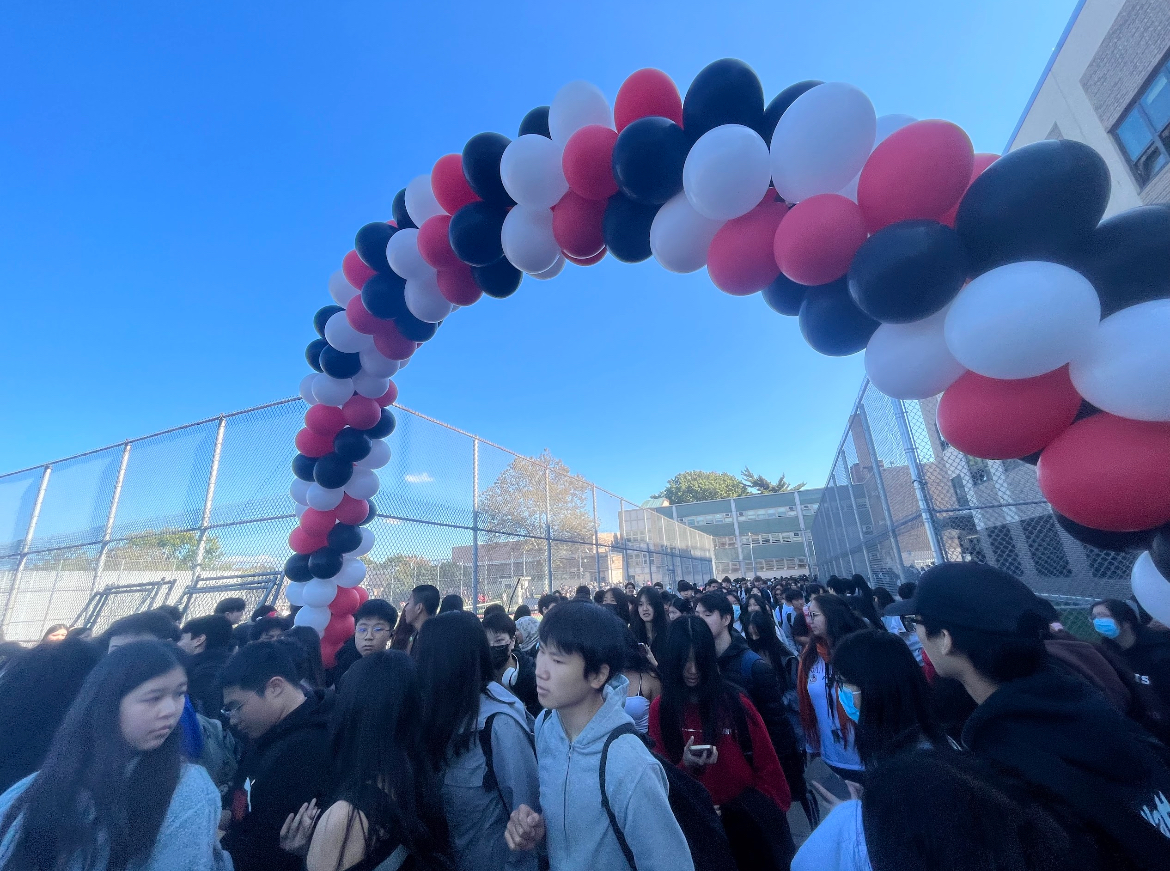 The balloon arch, signifying where the pep rally is located. 