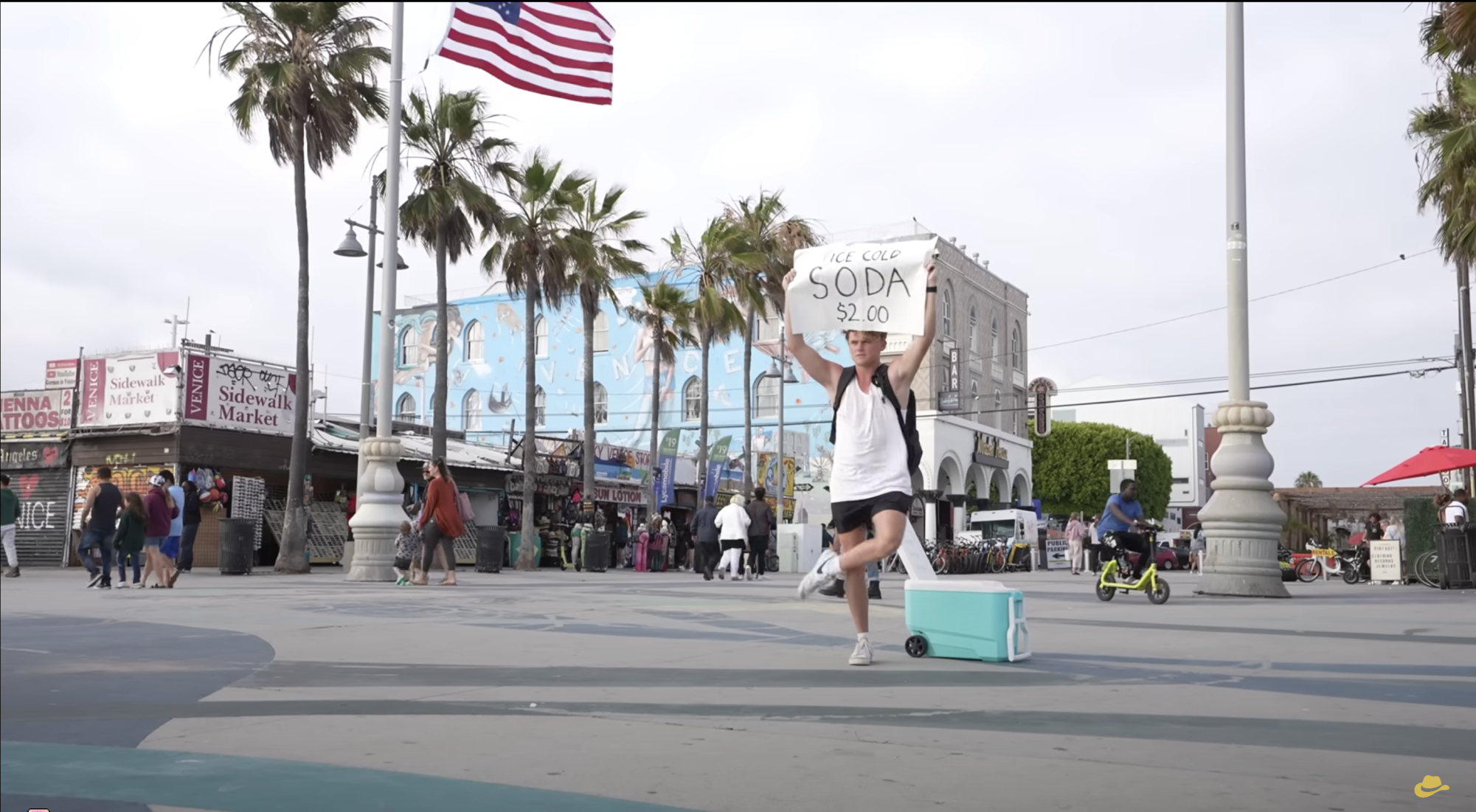 Day 1- Venice Beach, California: 
Trahan sells sodas, using signs to attract customers. 
