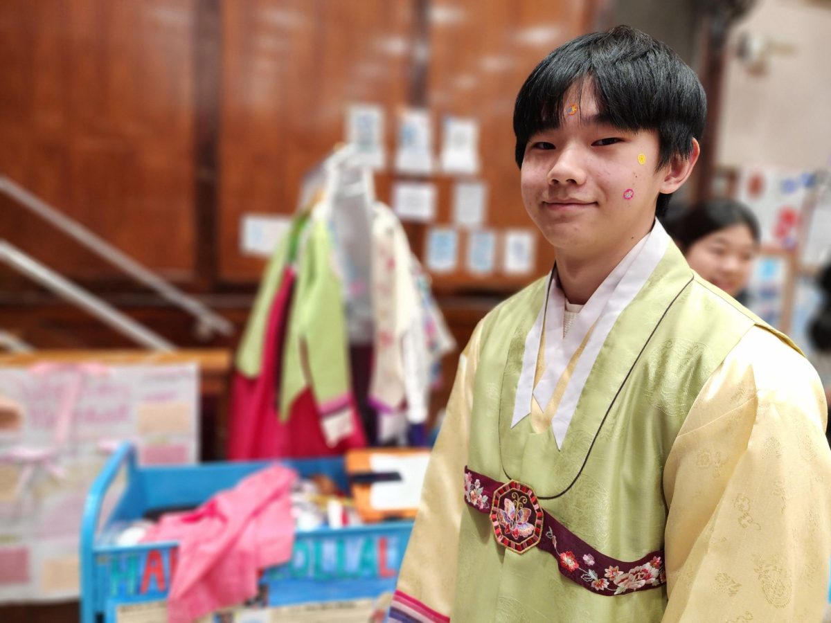 FLHS Student wearing hanbok, which is a traditional Korean clothing people would wear on holidays.


