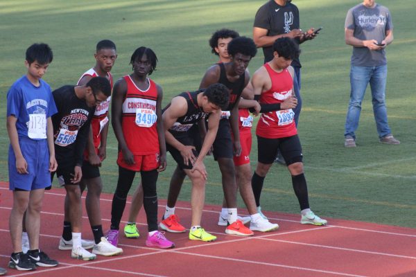 Peter Karasakalides gets ready for the 1500 meter dash at the Borough Multi’s at Martin Van Buren High School, lining up with the other athletes to compete in the final event of the track meet. 
