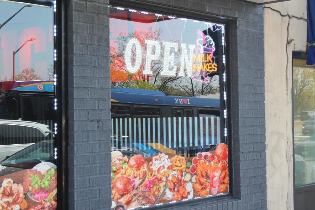 An appealing sign displaying how Halal Chicken n Chapli is open for businesses.
