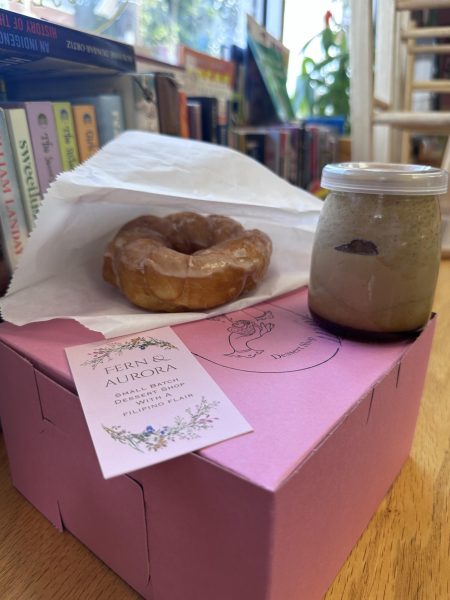 Maple glazed doughnut and pumpkin flan accompanied with their business card and box of other goodies.